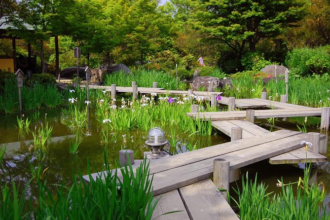 Private Car Full Day Tour of Osaka Temples, Gardens and Kofun Tombs - Shinsekai: a Journey Through Osakas Entertainment Past